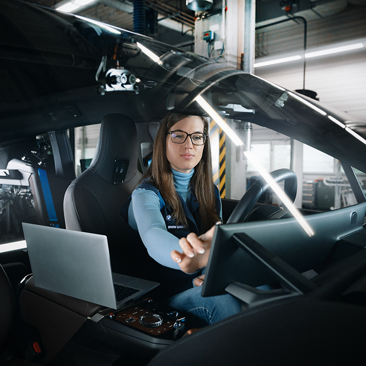 A female engineer in a car 