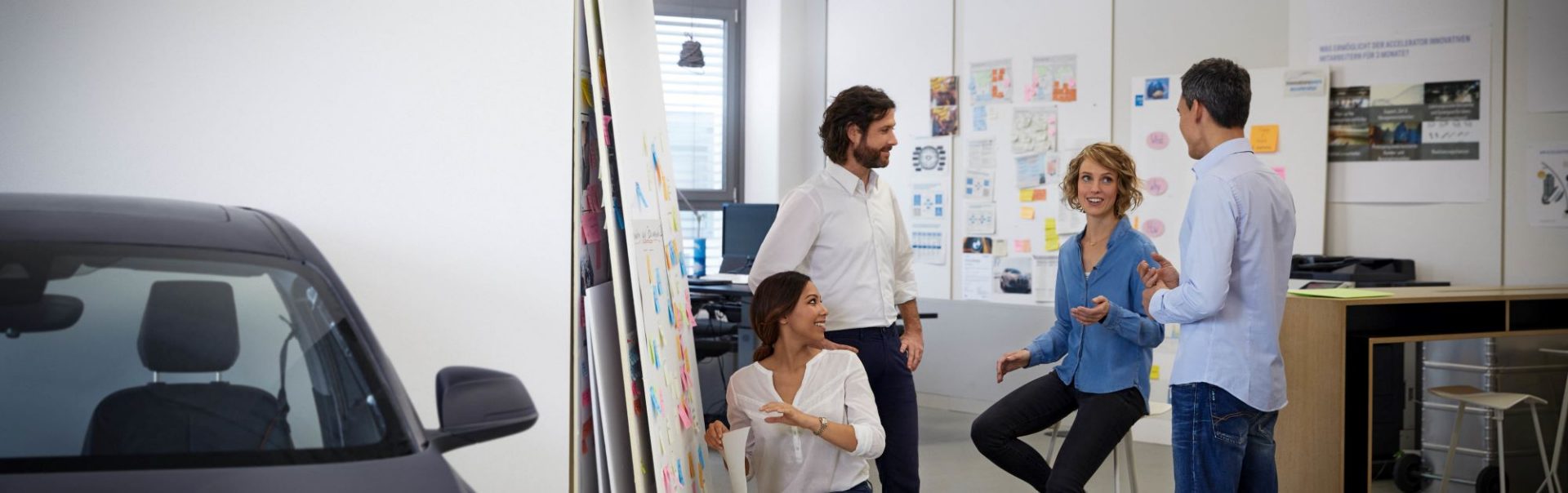 BMW employees are meeting for an IT project management appointment.