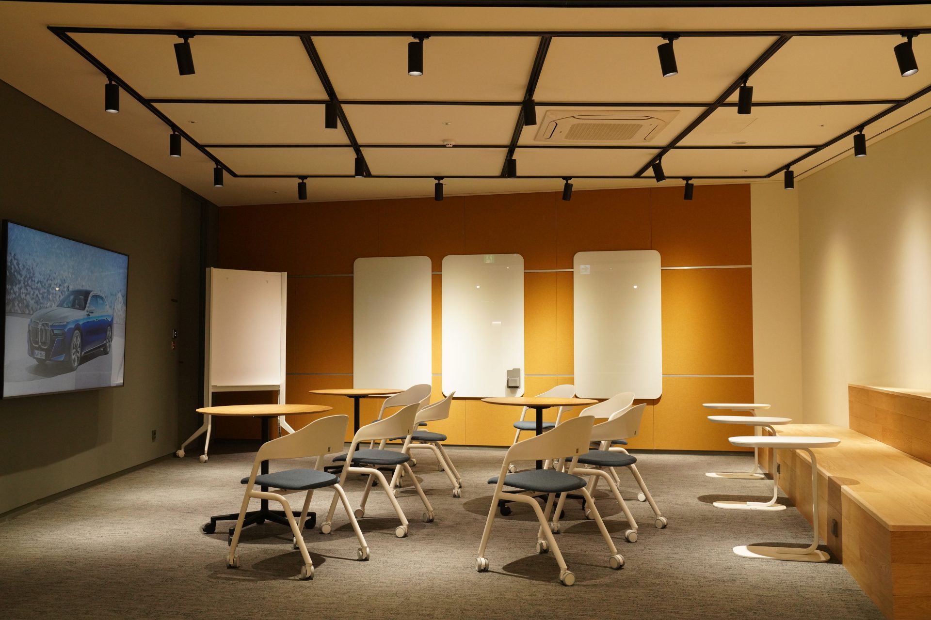 The image shows a meeting room at BMW Group Korea.