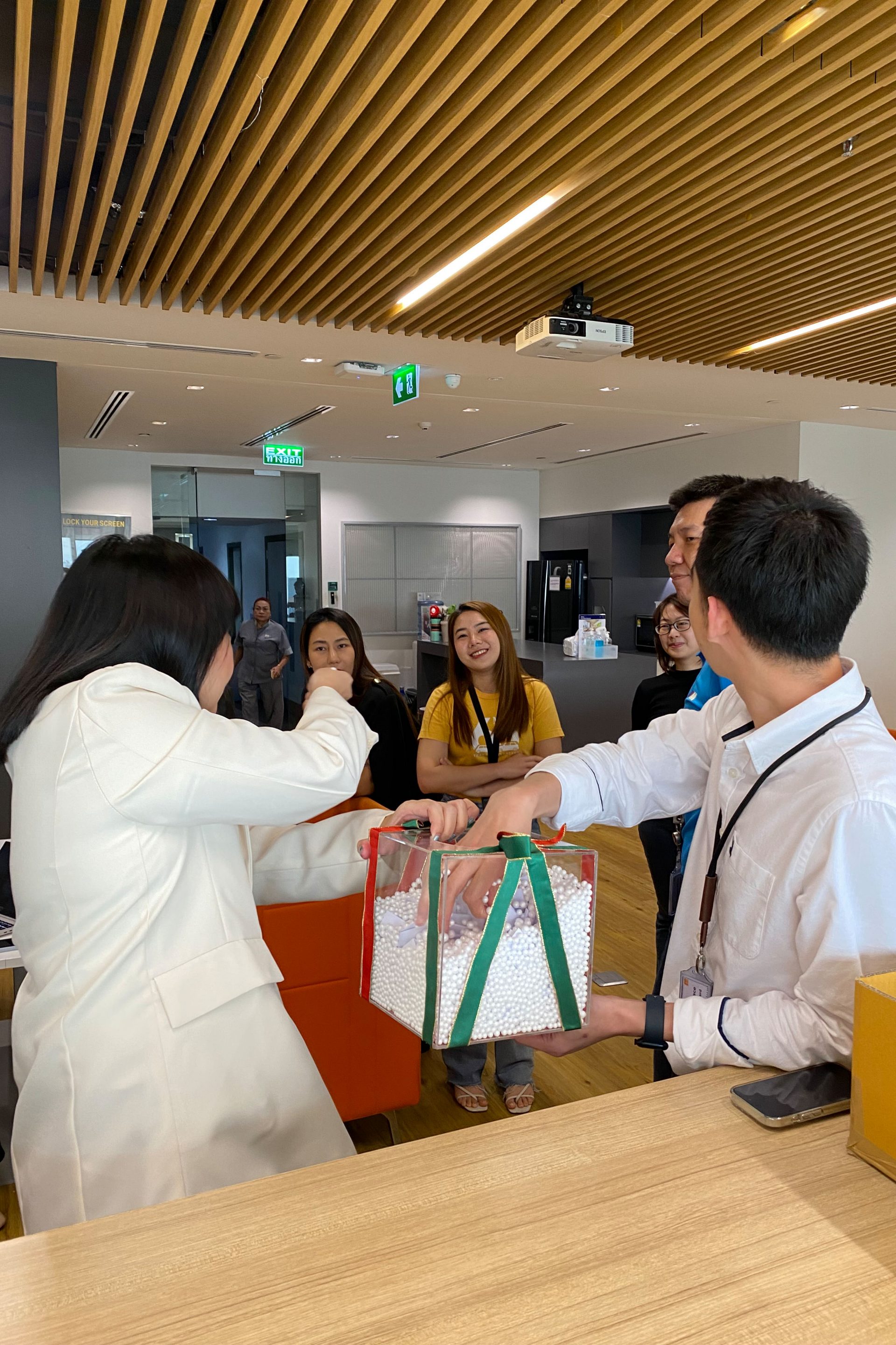 BMW Group Thailand employees discussing earth day.