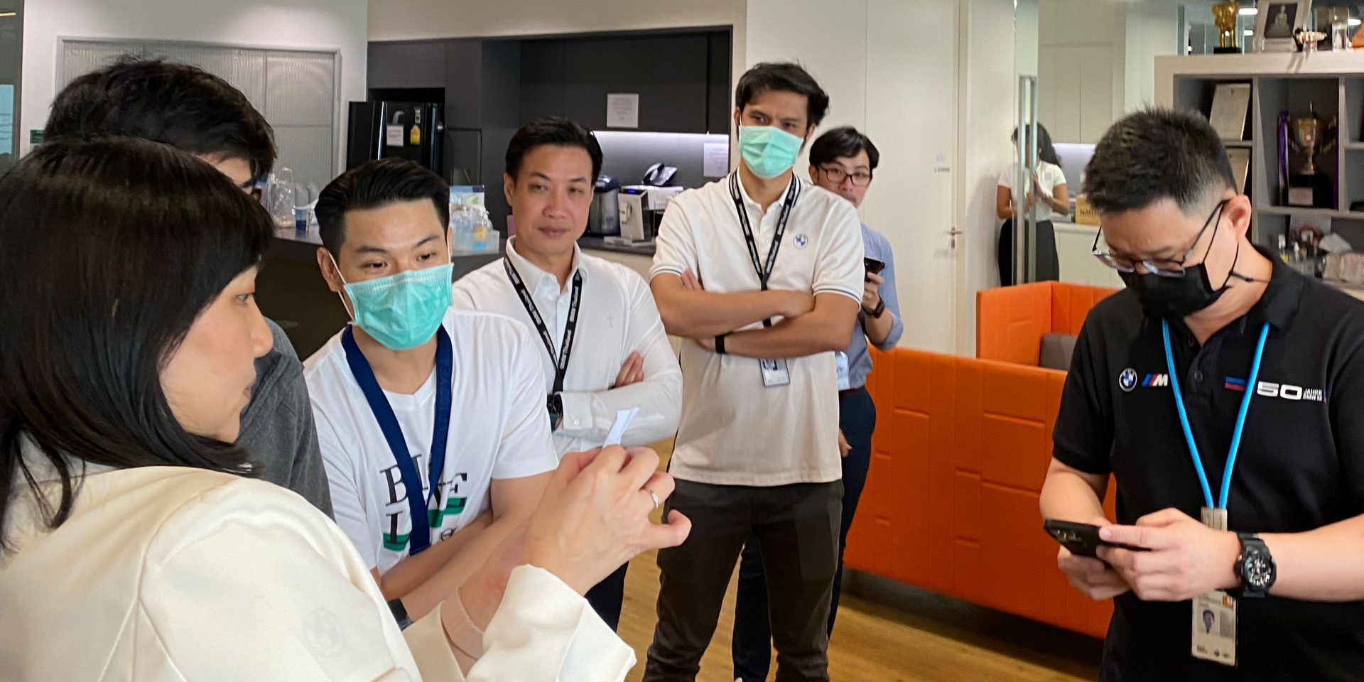 BMW Group Thailand employees discussing earth day.