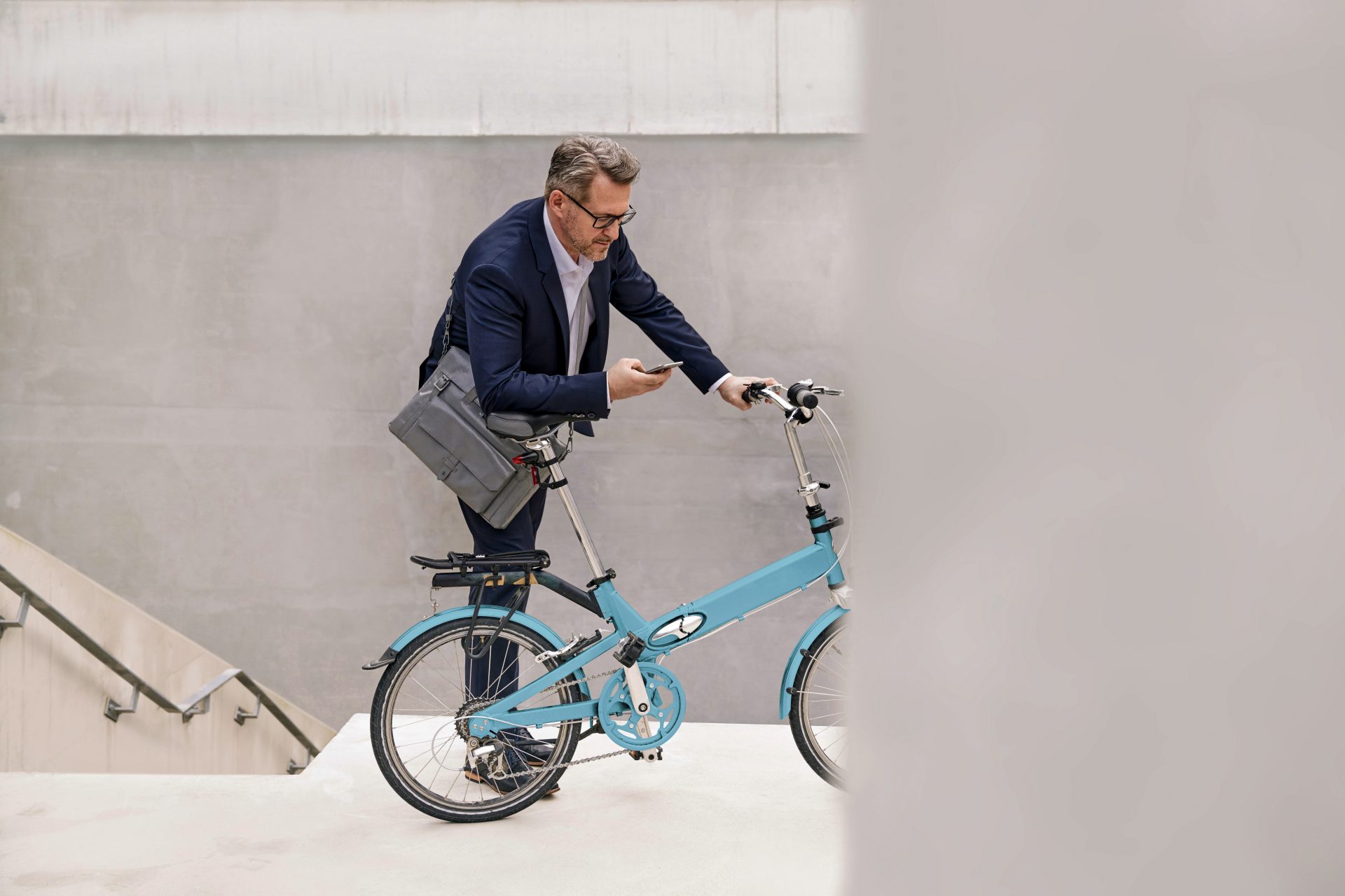 An interested customer is currently getting on a BMW bike.