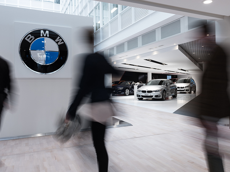 The picture shows a BMW location with the brand logo.