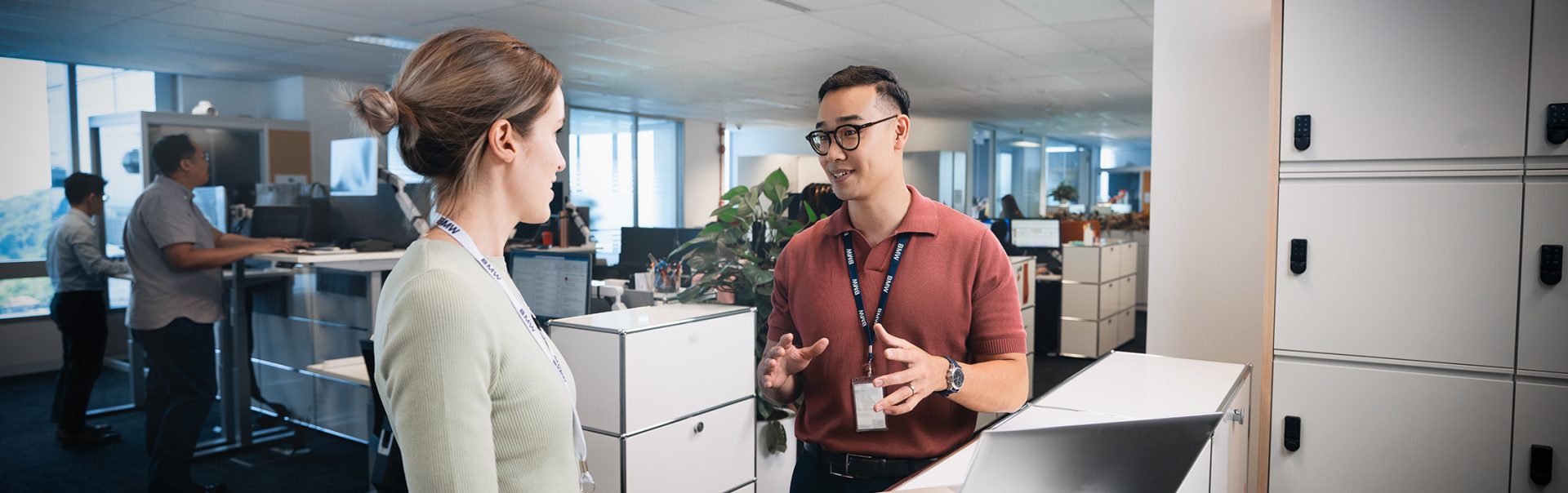 Two recent graduates having a conversation