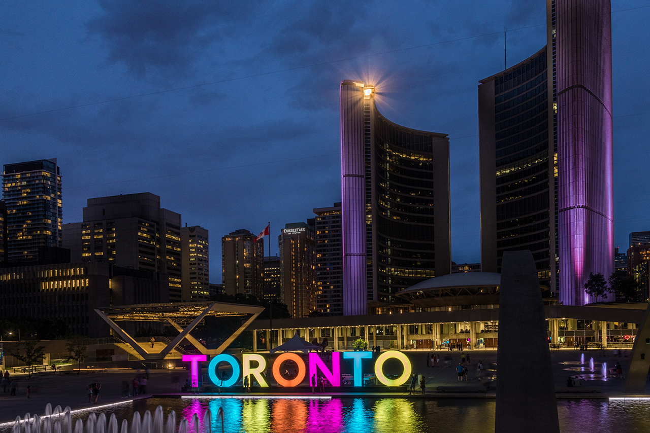 Neon Sign reading 'Toronto' at the waterfront in Toronto.
