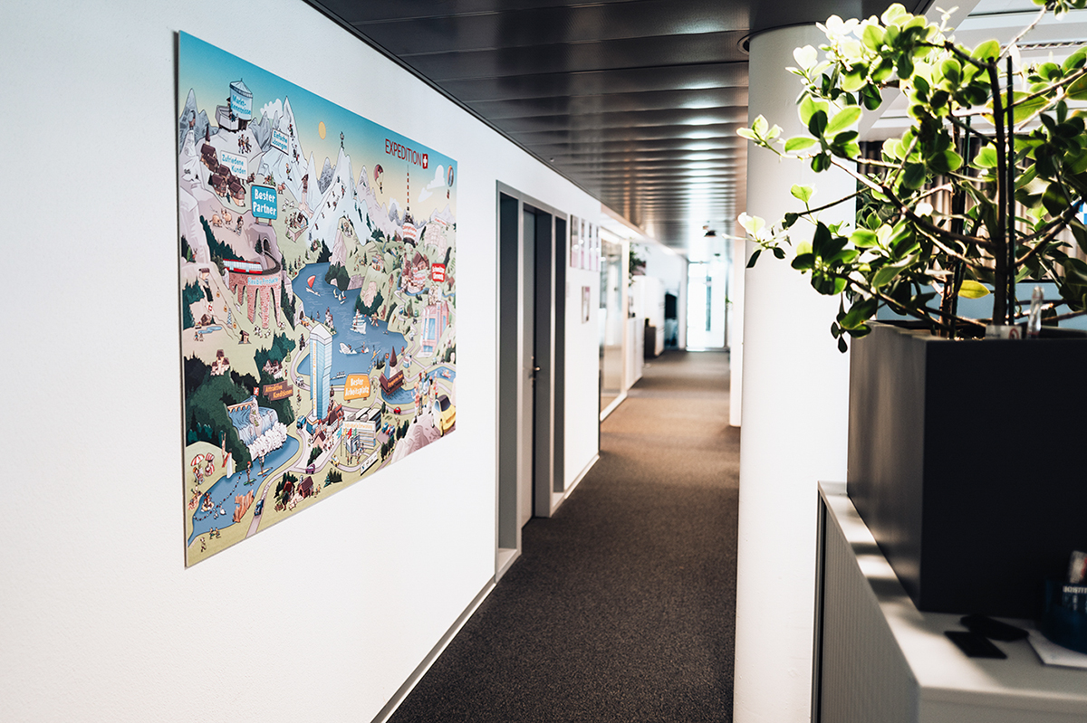 Headquarter Dielsdorf Interior of one of the modern and open designed offices with a colorful painting hanging on the wall.