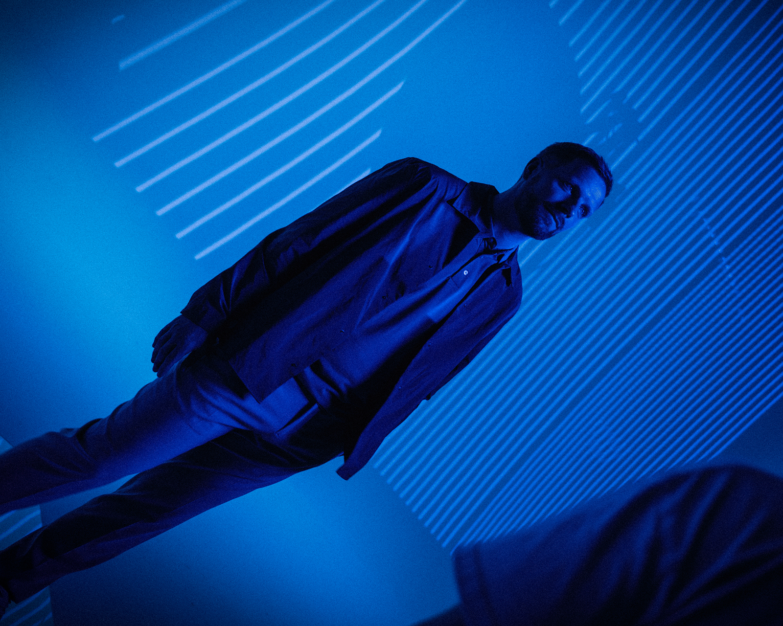 Designer Anders in a blue room