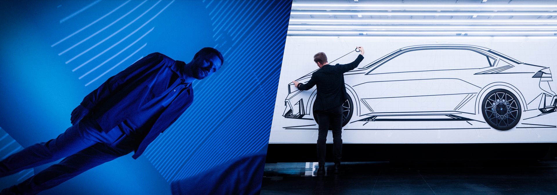 Designer Anders standing in front of a big sketch wall