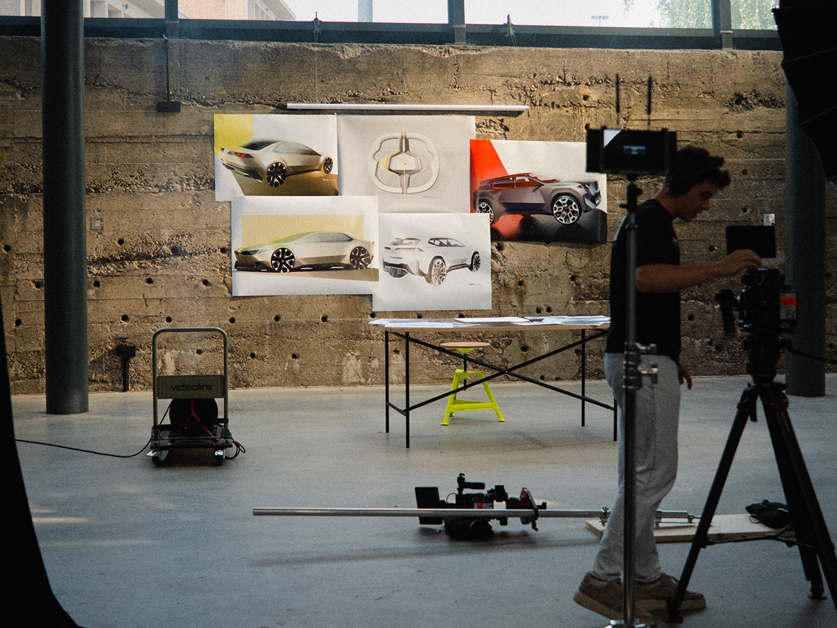 design office with sketches on the wall, behind-the-scenes material