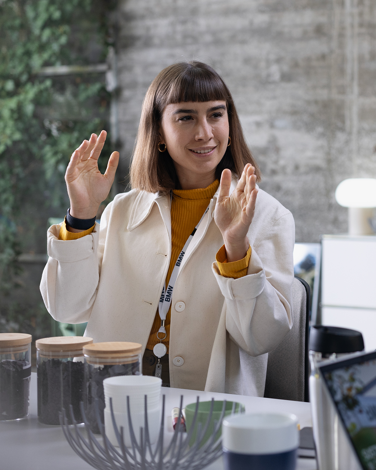 Colleague in sustainability explaining something to her colleague about sustainable materials.