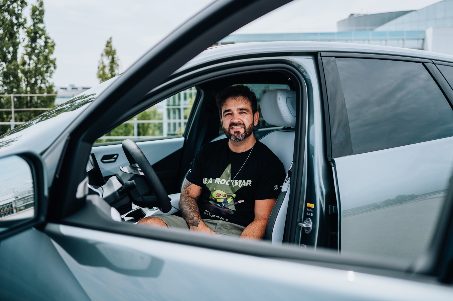 BMW software architect Matheus in a BMW iX3