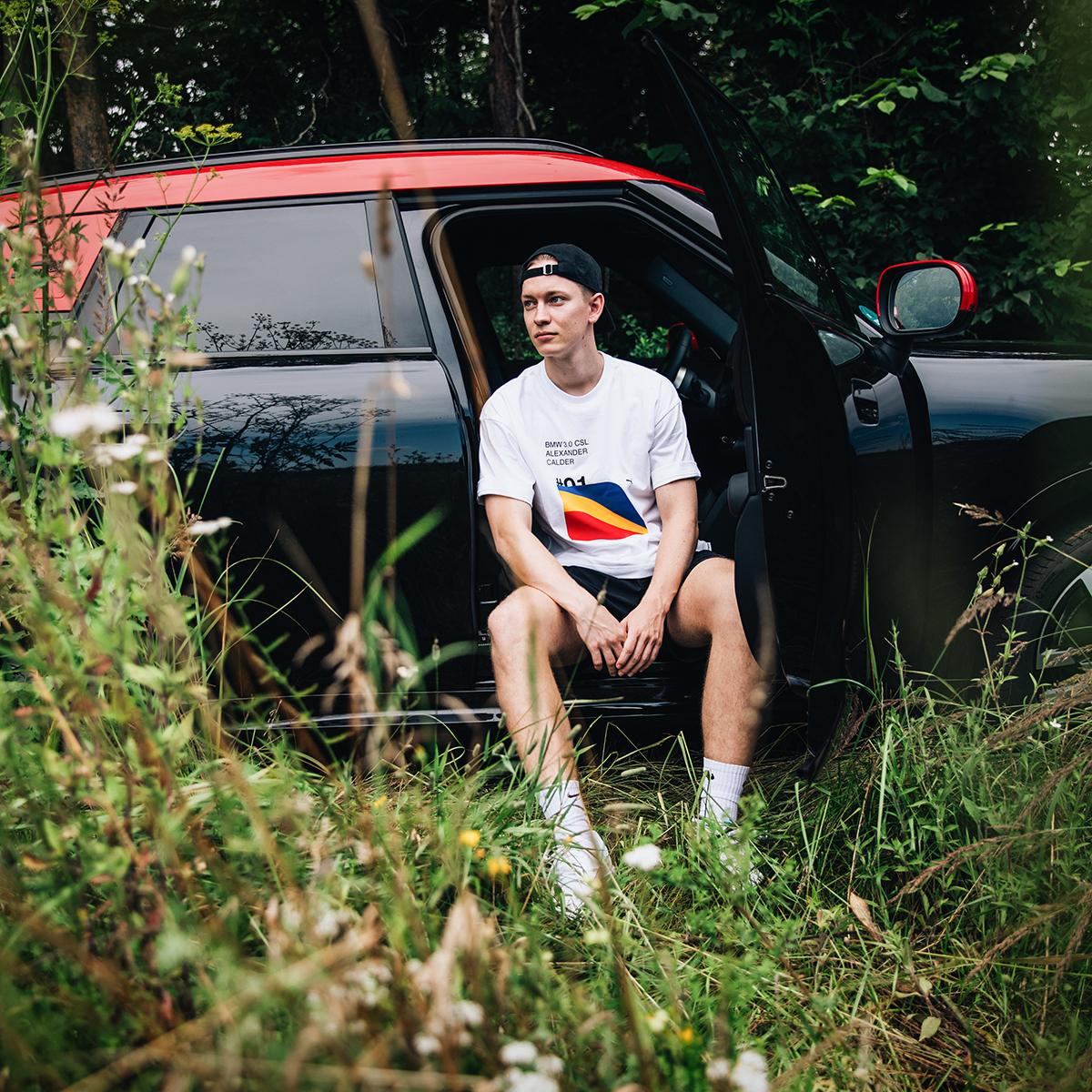 Student in the nature with his MINI Countryman.