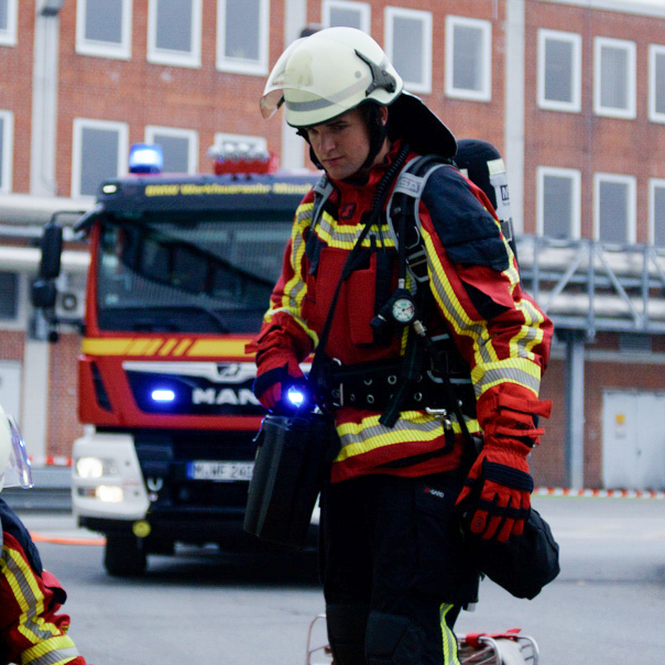 BMW factory fire brigade member in action with equipment.