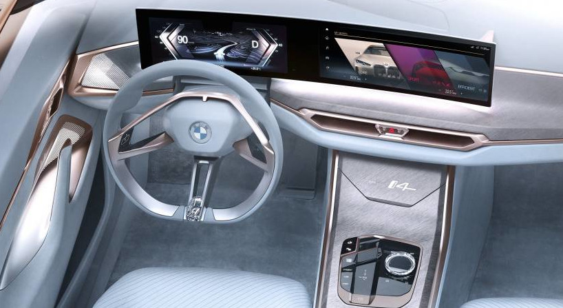 Futuristic dashboard design of the BMW i4 with advanced display features.