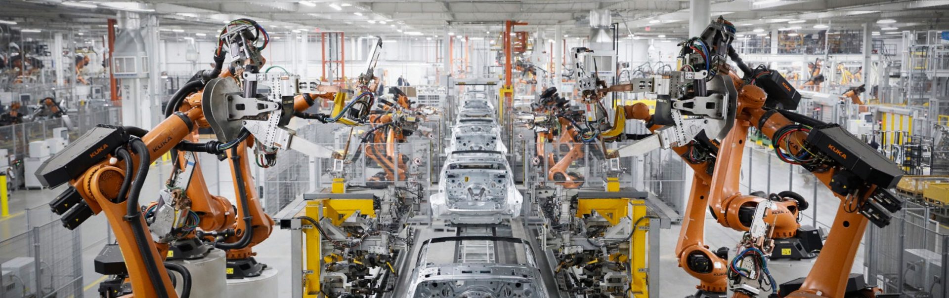 The picture shows a production line at a BMW factory.