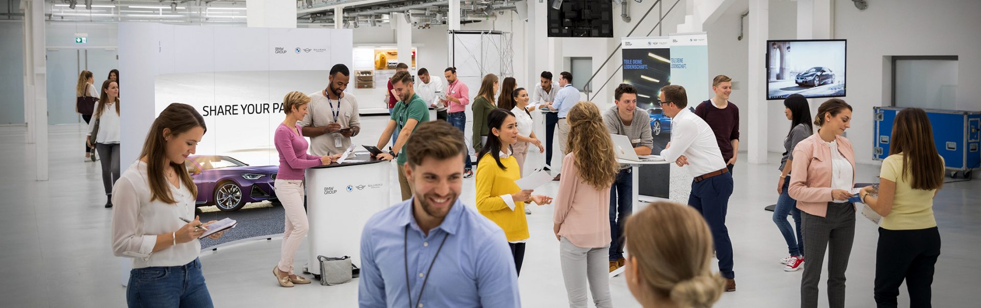 A crowd at a BMW Group Event for Professionals.