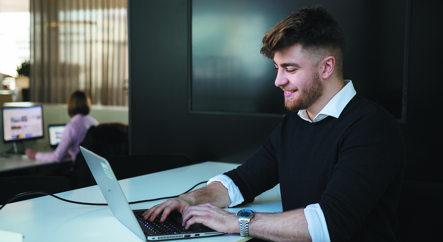 Apprentice Tamer with a laptop