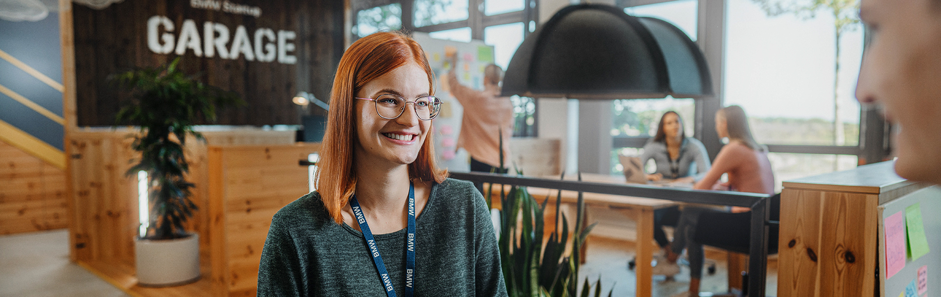 An apprentice at a meeting in the BMW Startup Garage