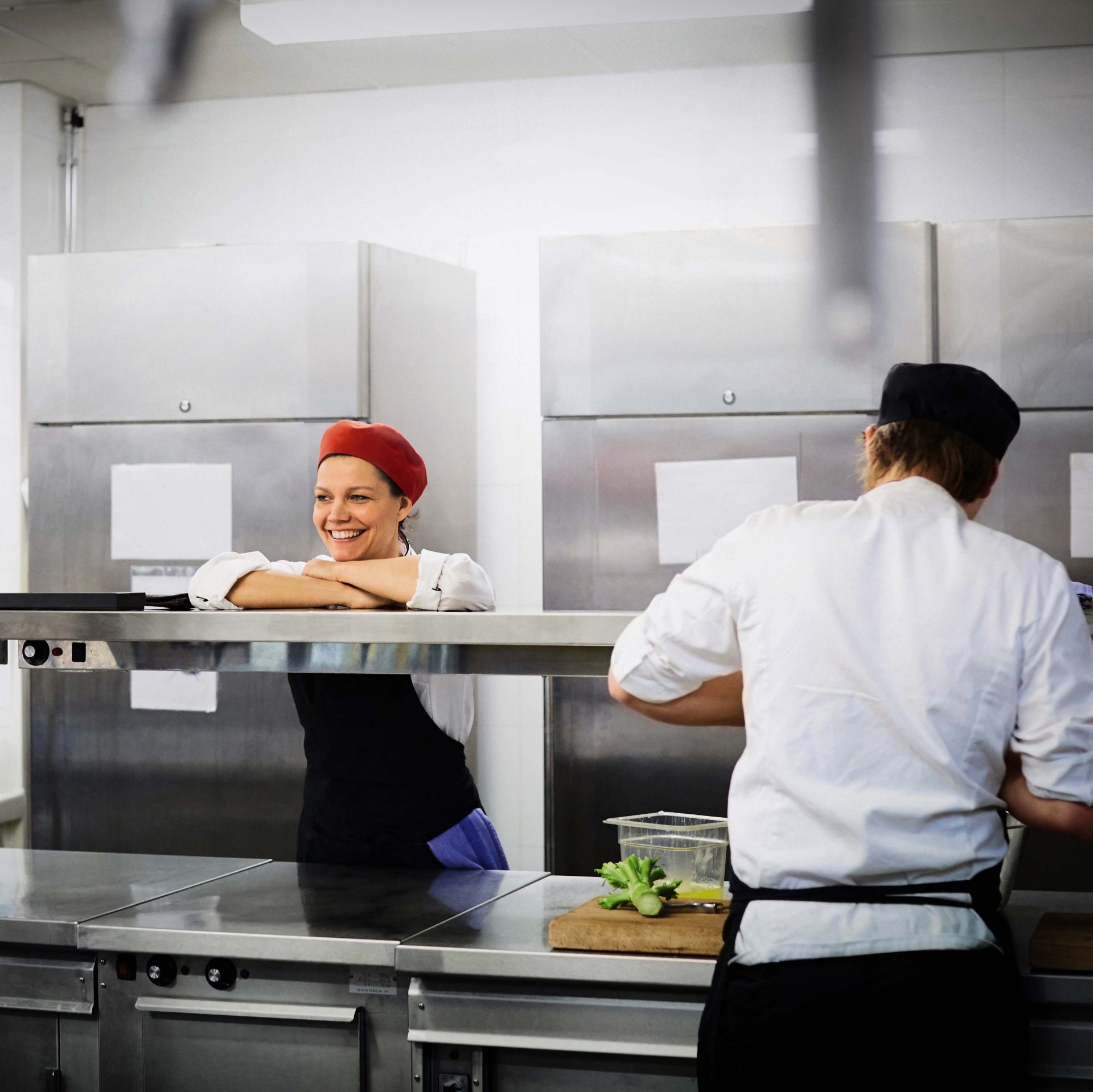 Two cooks in the BMW Company kitchen at work.
