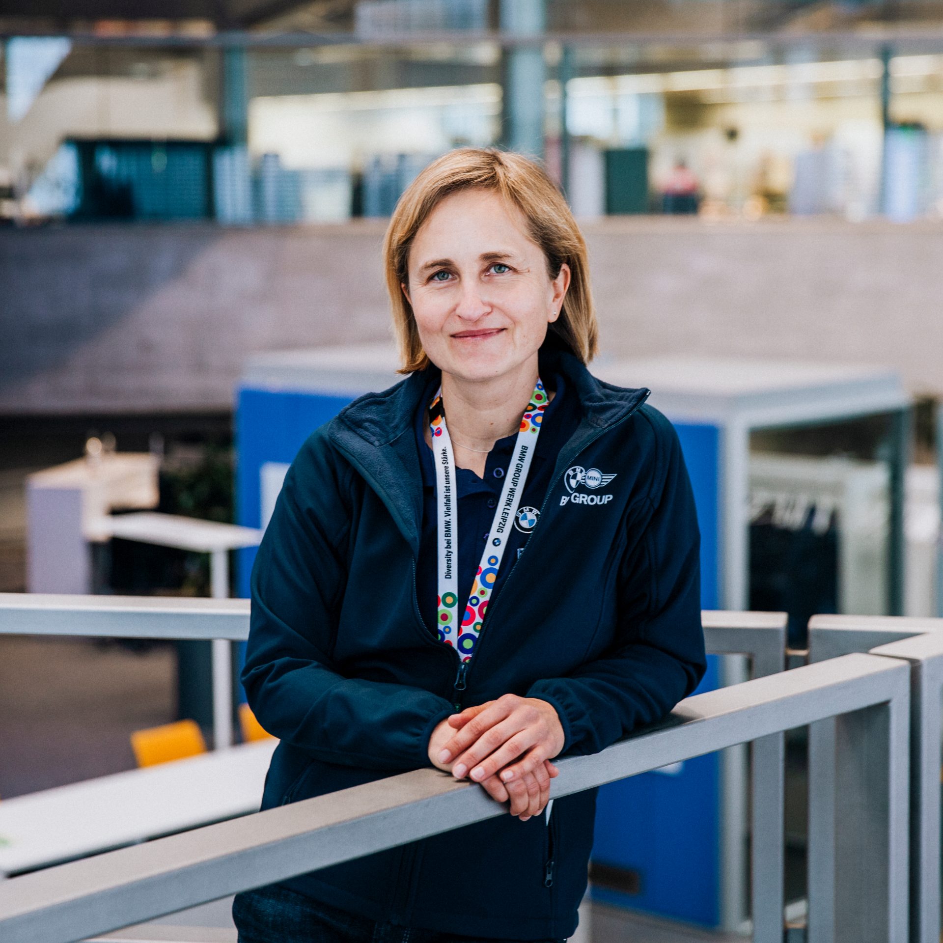 The Recruiter for apprenticeships at the BMW Group smiling at the camera.