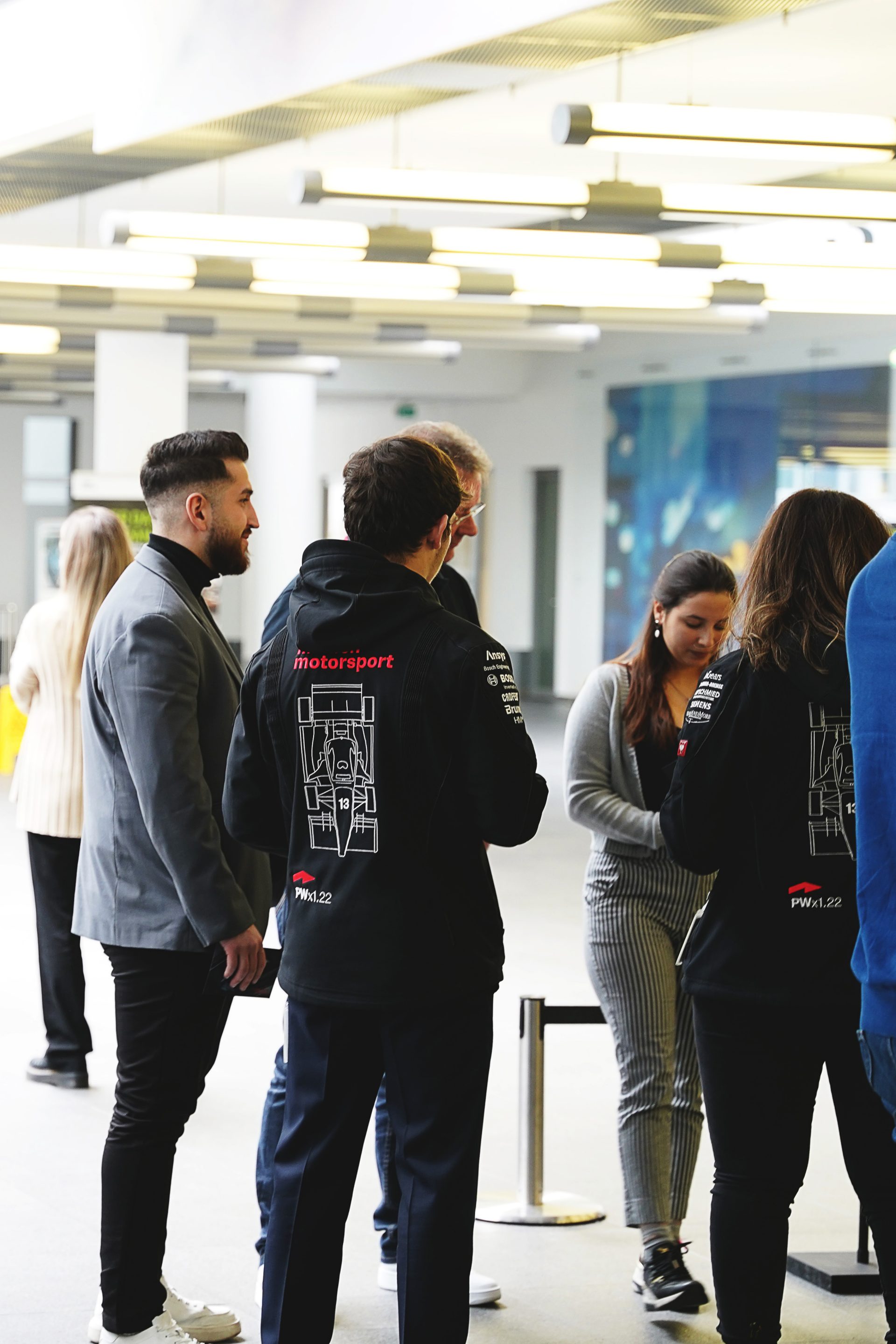 A group of people standing together at the FIZ event.