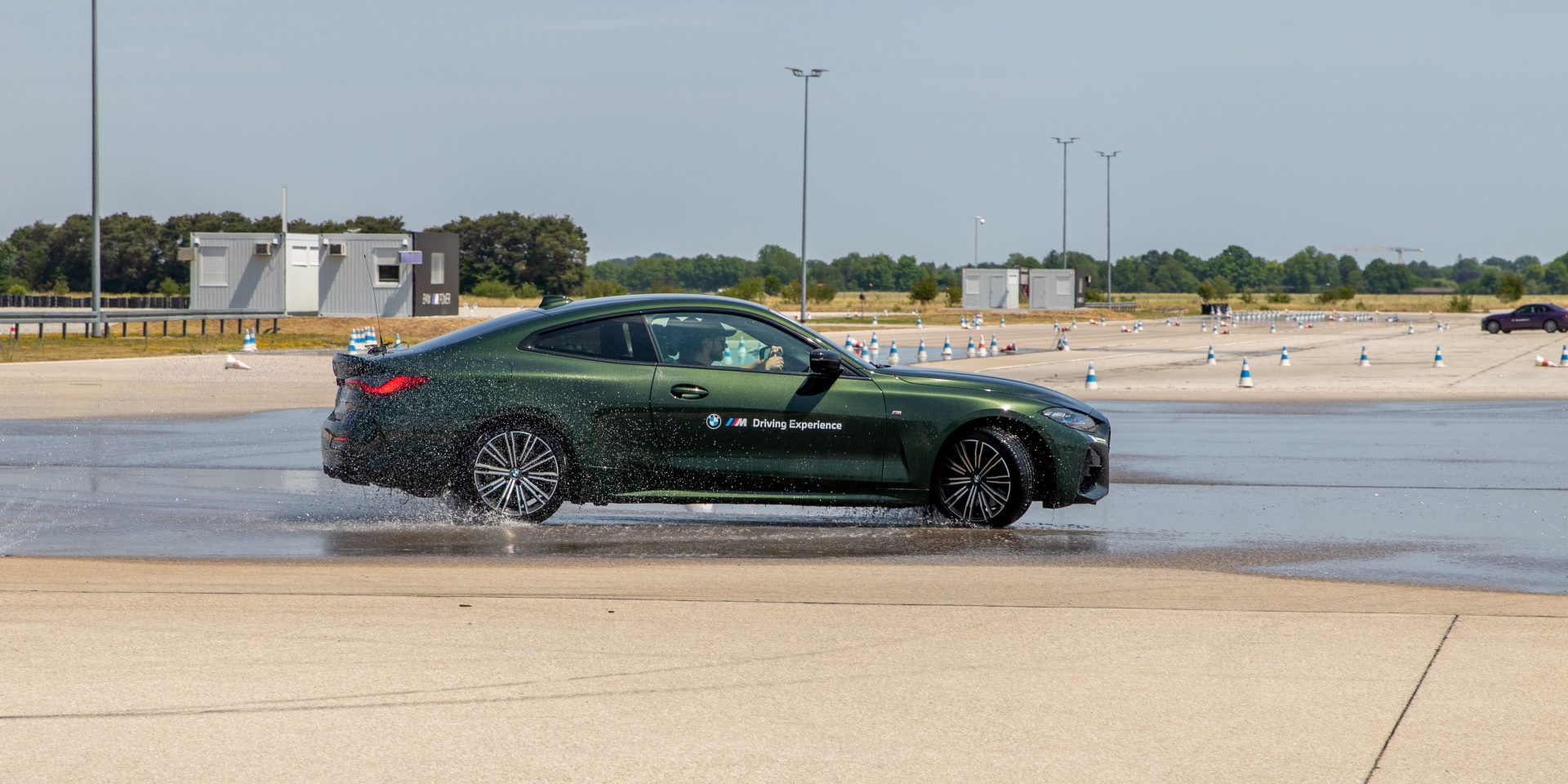 BMW M4 on a wet Testtrack.