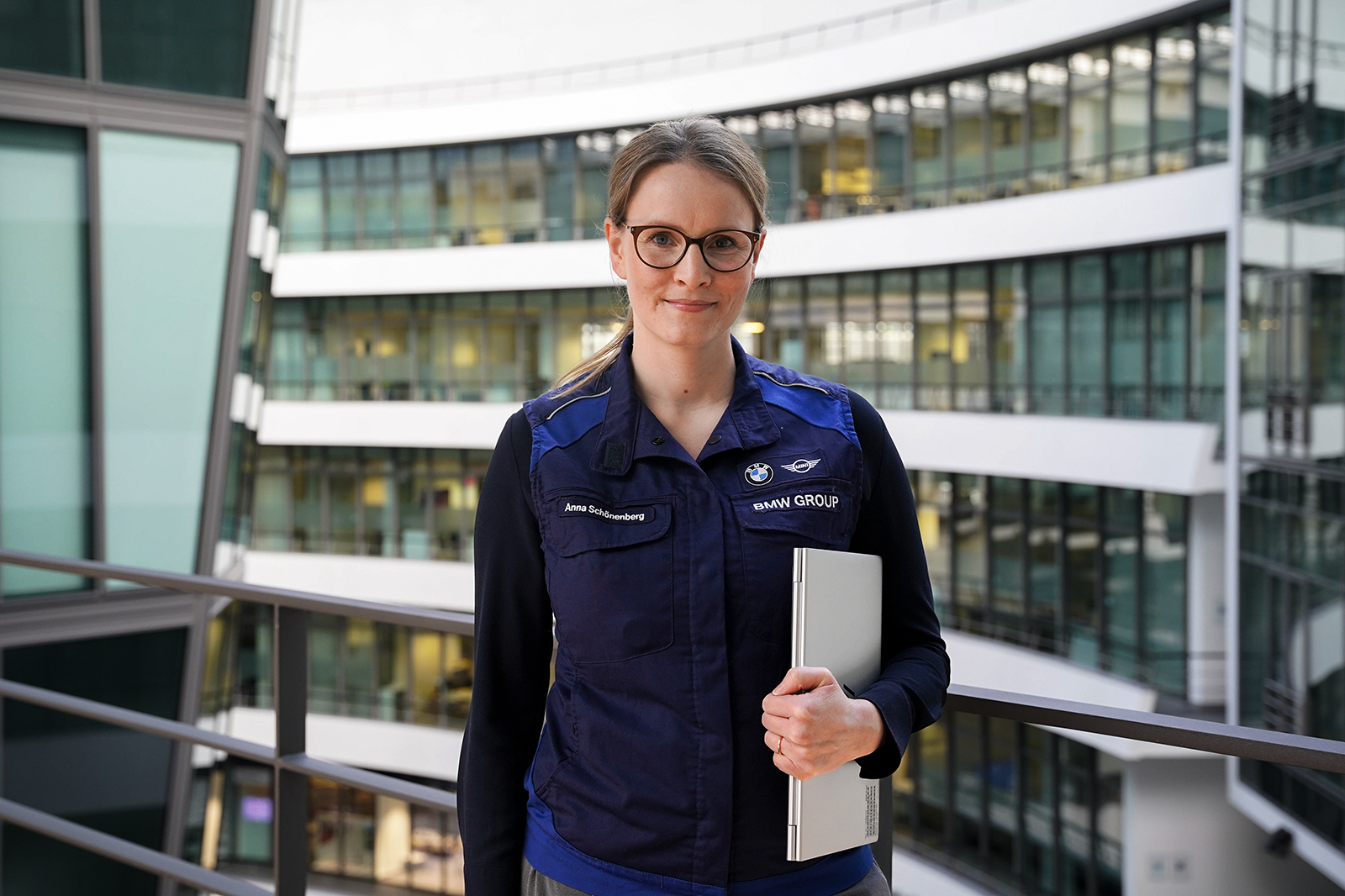 A participant of the Acceleration programme is smiling at the camera.
