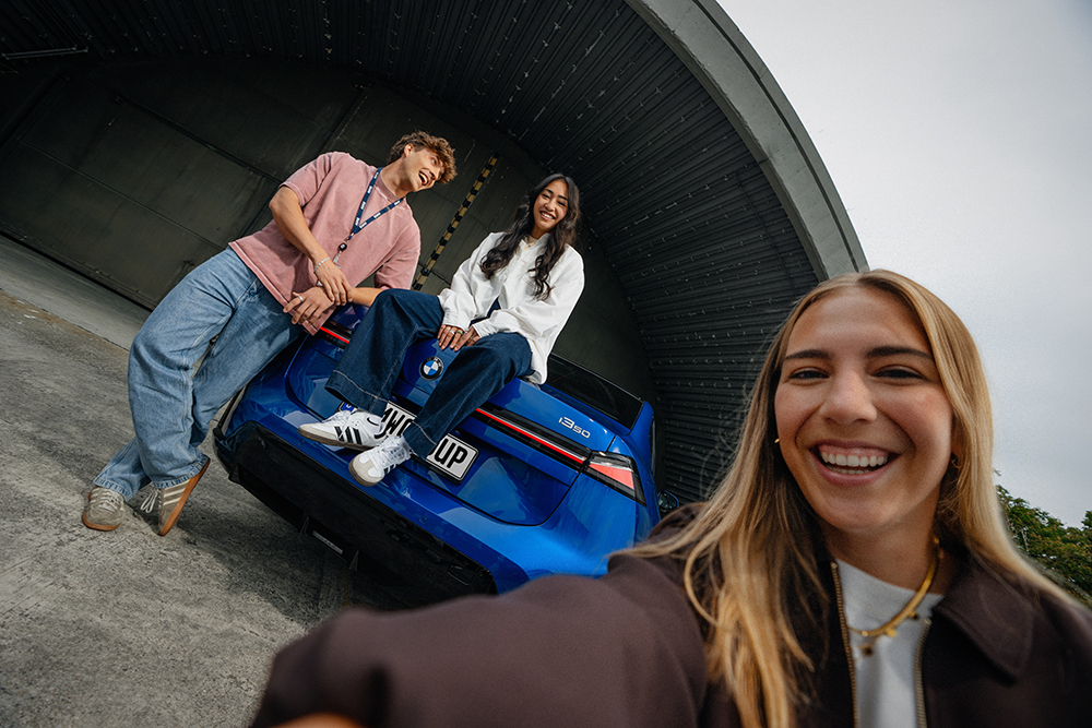 Three students enjoying their free time with a BMW i3