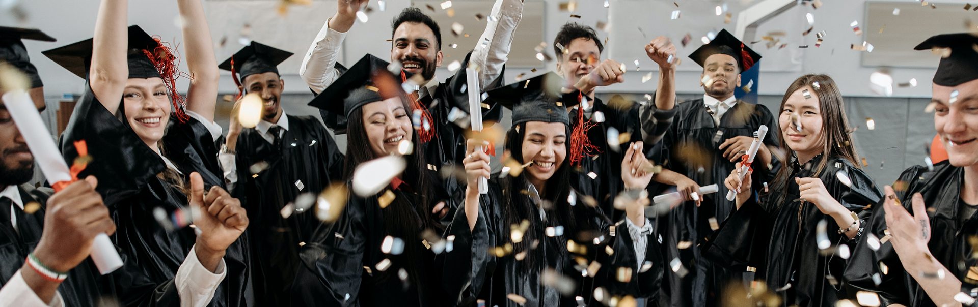 A group of Students celebrating that they finished their studies.