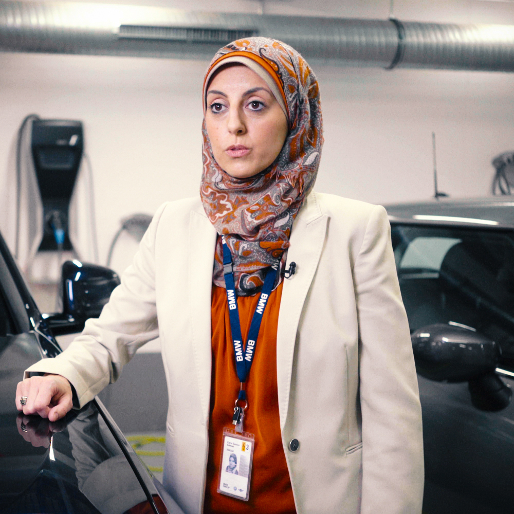 This picture shows Anjali who works at BMW.