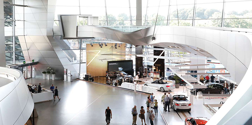 The picture gives an interior view of the BMW Welt in Munich. 