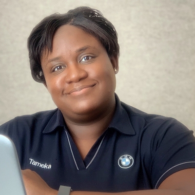 This picture shows Tameka who works at BMW.