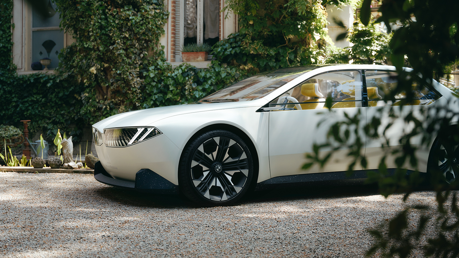 BMW Neue Klasse Concept Car in a green outdoor environment