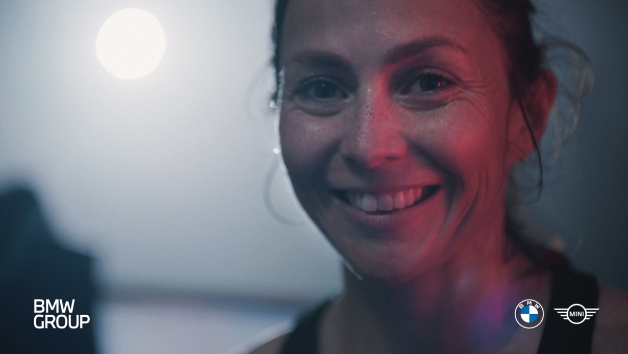 Close up of a smiling BMW Group employee doing sports