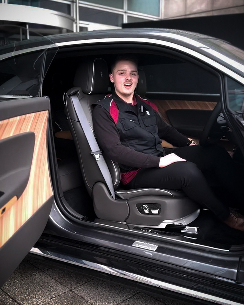 george, a technical apprentice in a car