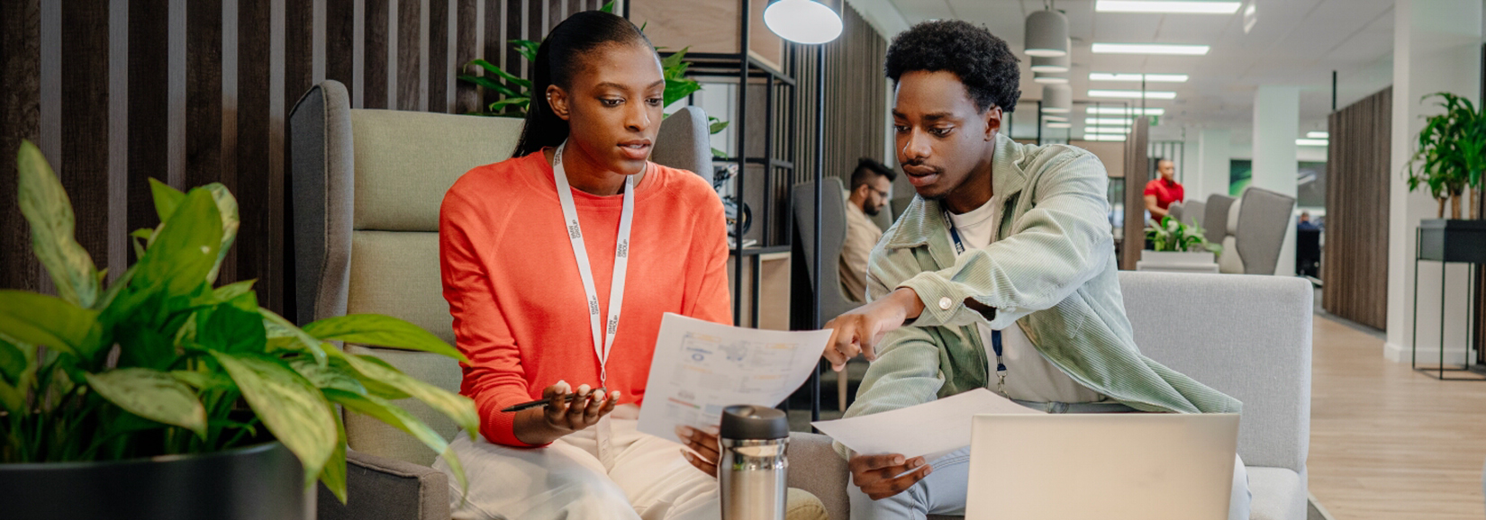 Two young colleagues in a meeting