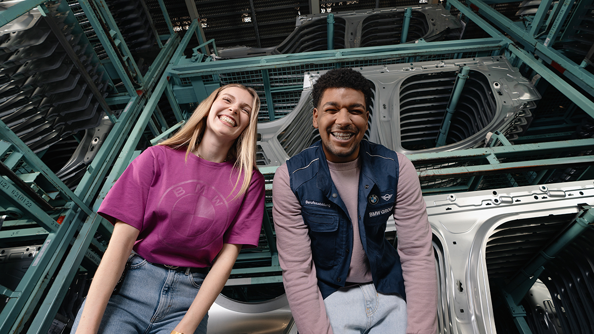 Two students laugh heartily