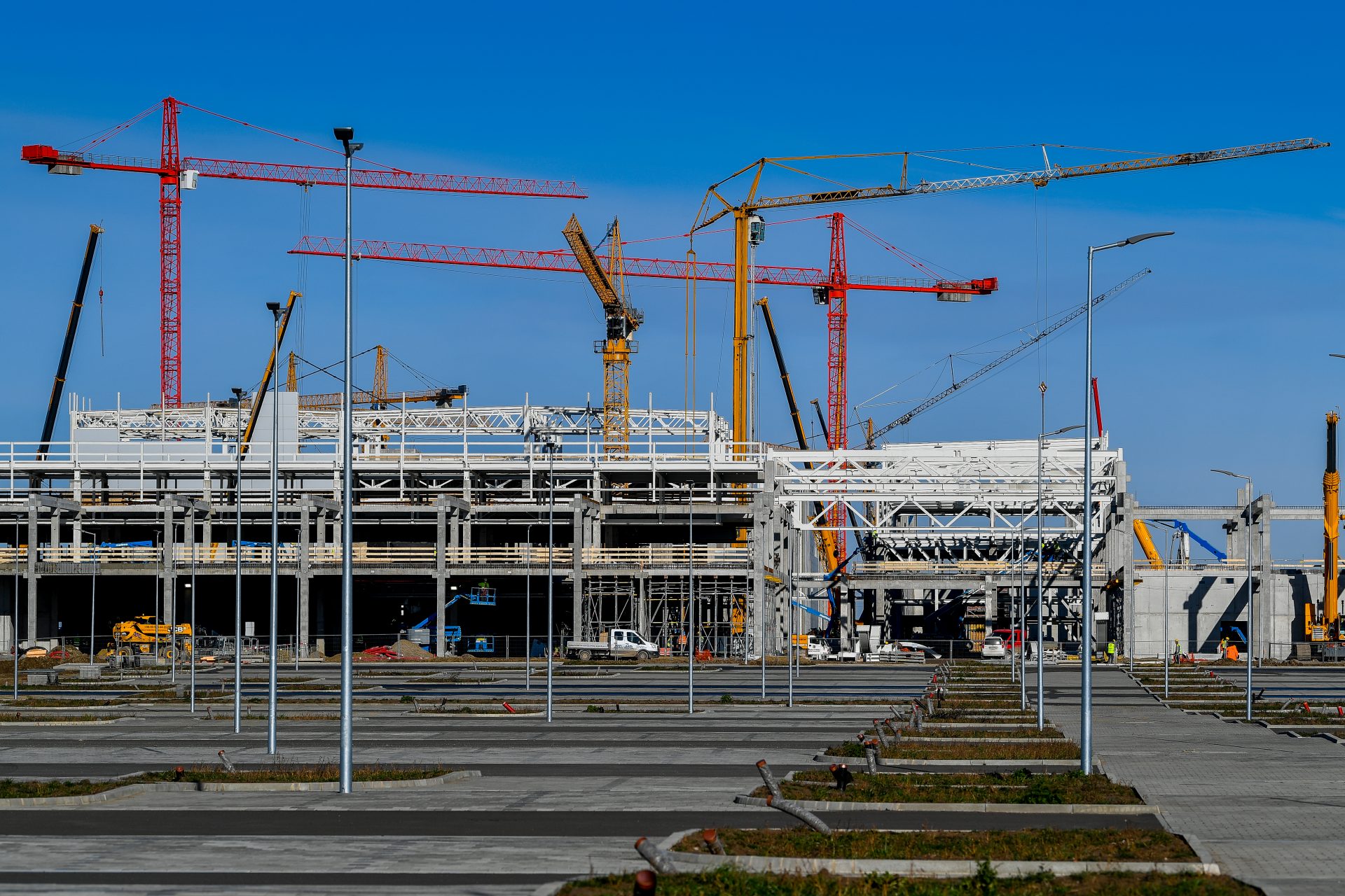 The image shows an aerial view of the BMW plant and headquarters in Munich.