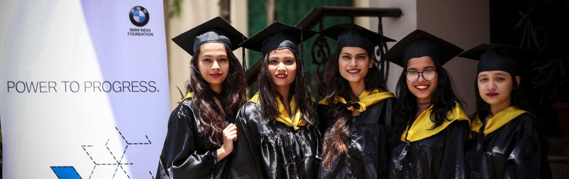 BMW employees at graduation ceremony.