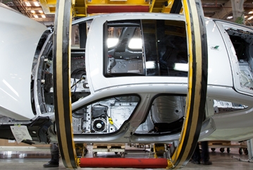 The picture shows the a car being build in the Chennai production line.