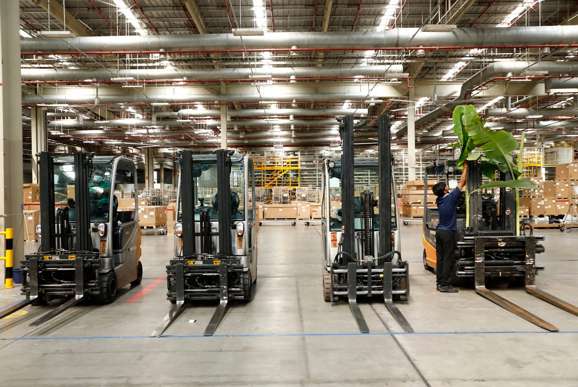 Forklifts being decorated in BMW Group Chennai plant.