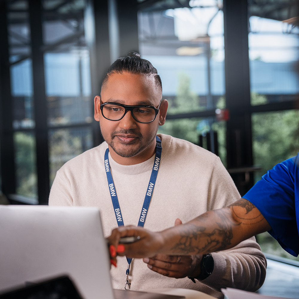 Two colleagues in a meeting room