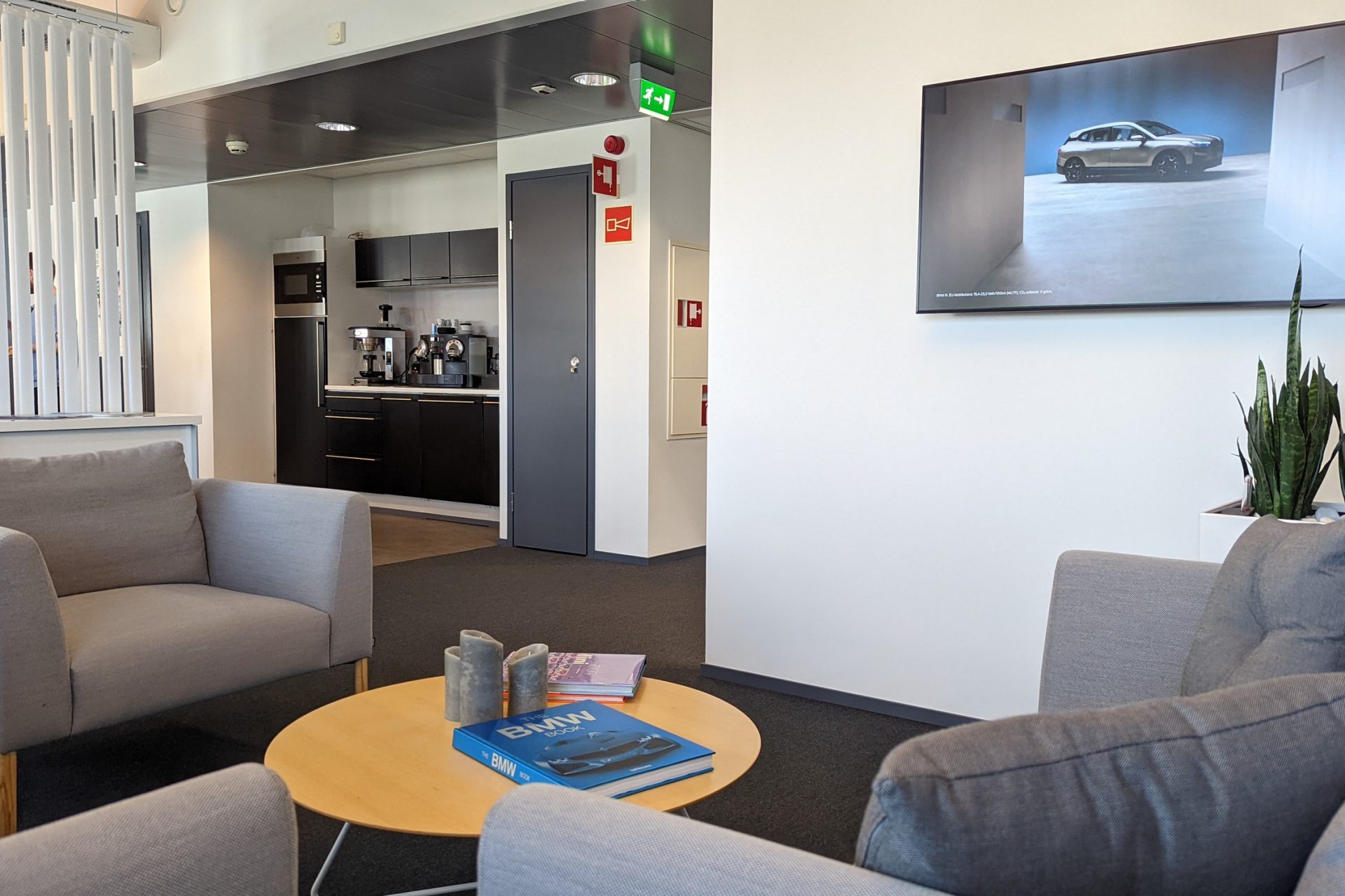 This picture shows the interior-view of a BMW office in Finland.