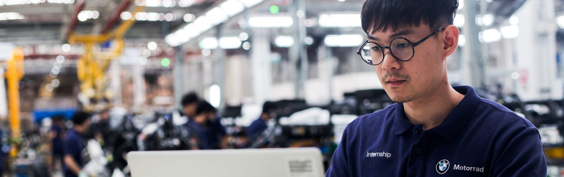 Student working with laptop.