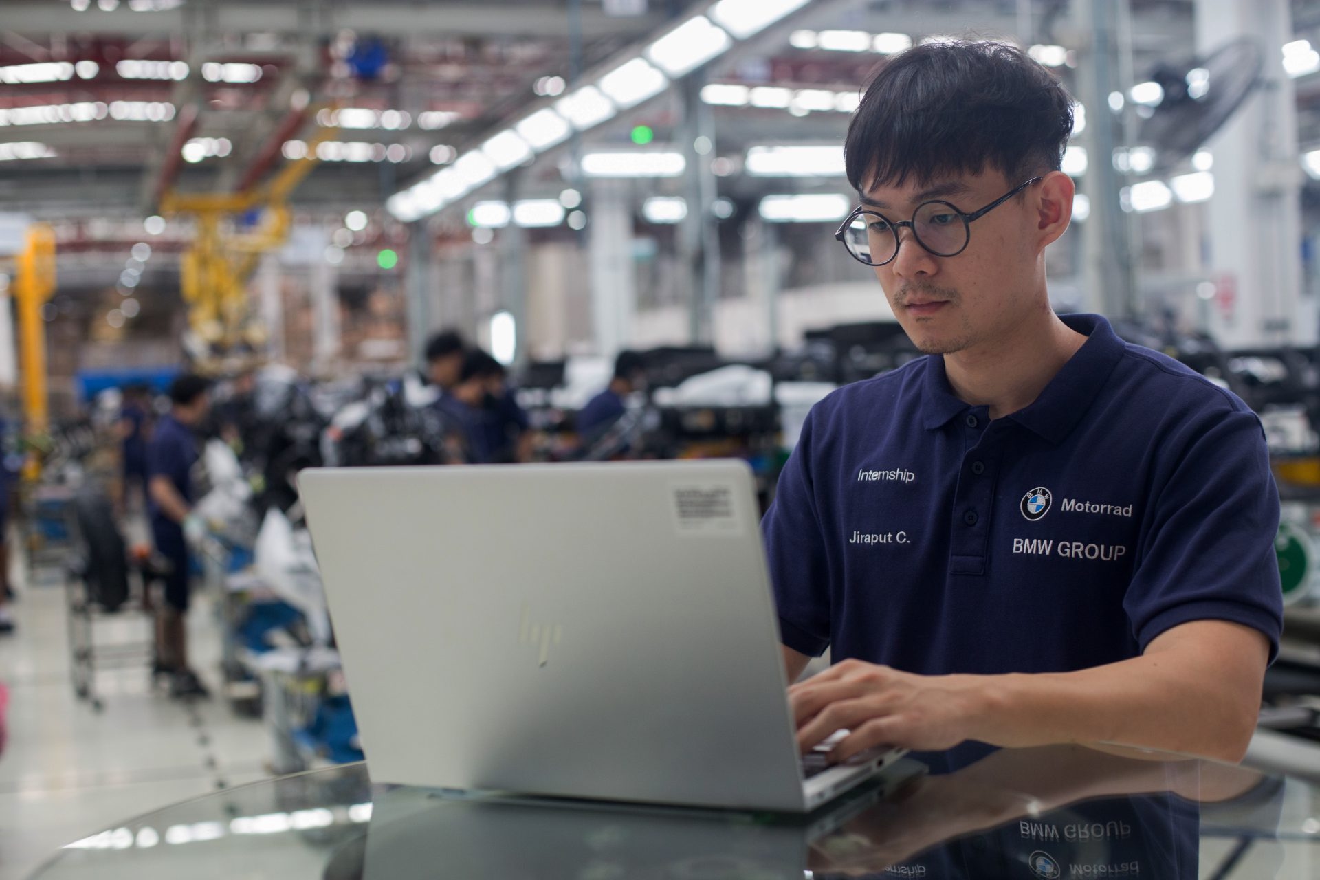 Student working with laptop.