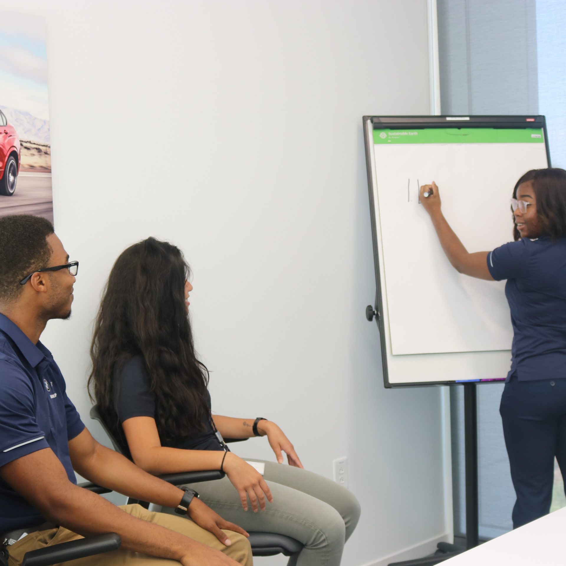 This picture shows a group of domestic interns in a meeting.