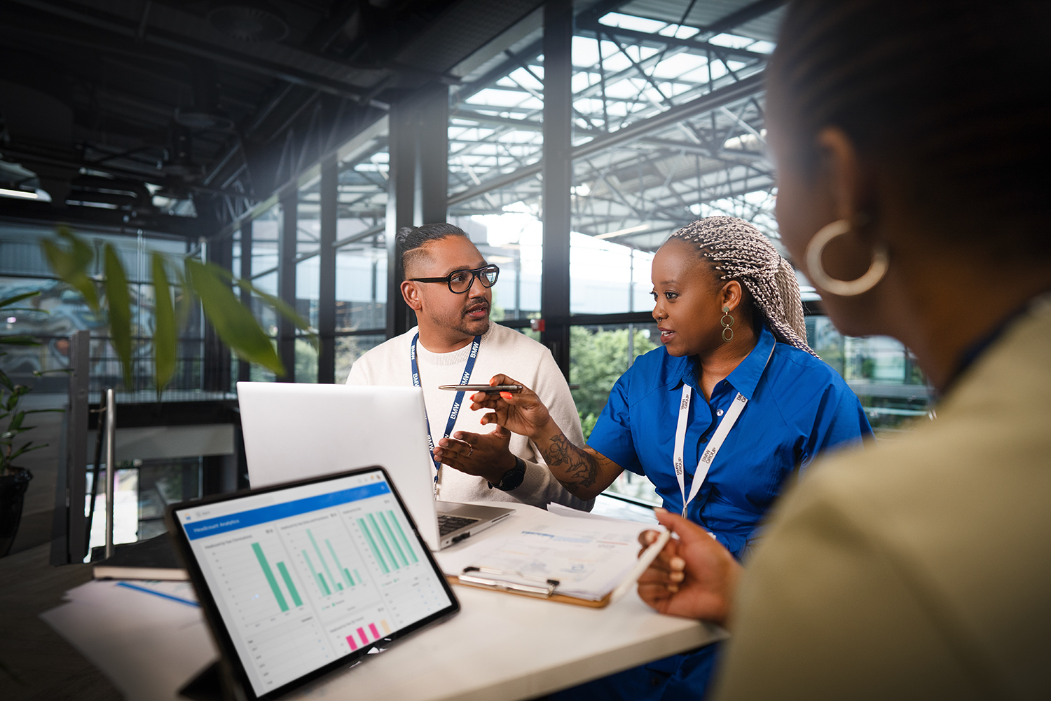 Three colleagues working in the office in Midrand
