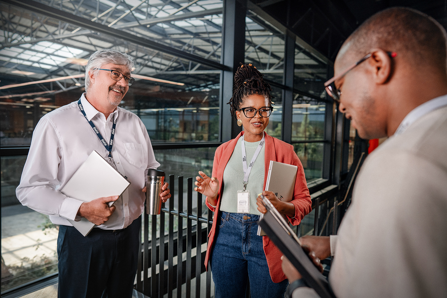 Three colleagues working in the office in Midrand
