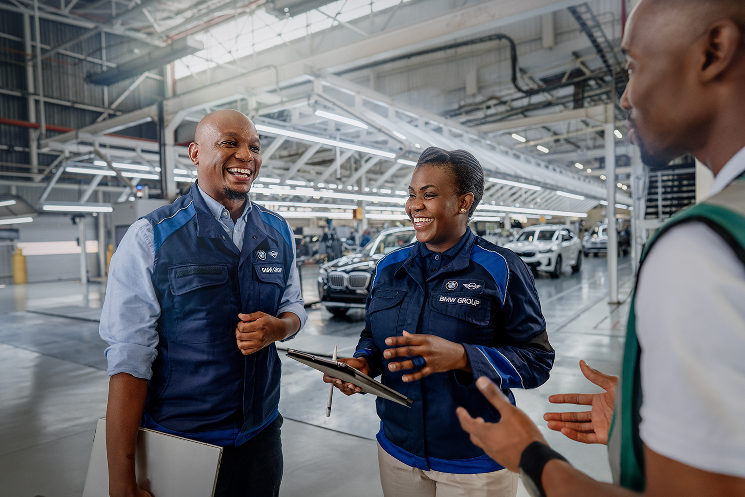 Three employees in the BMW Group Plant Rosslyn.