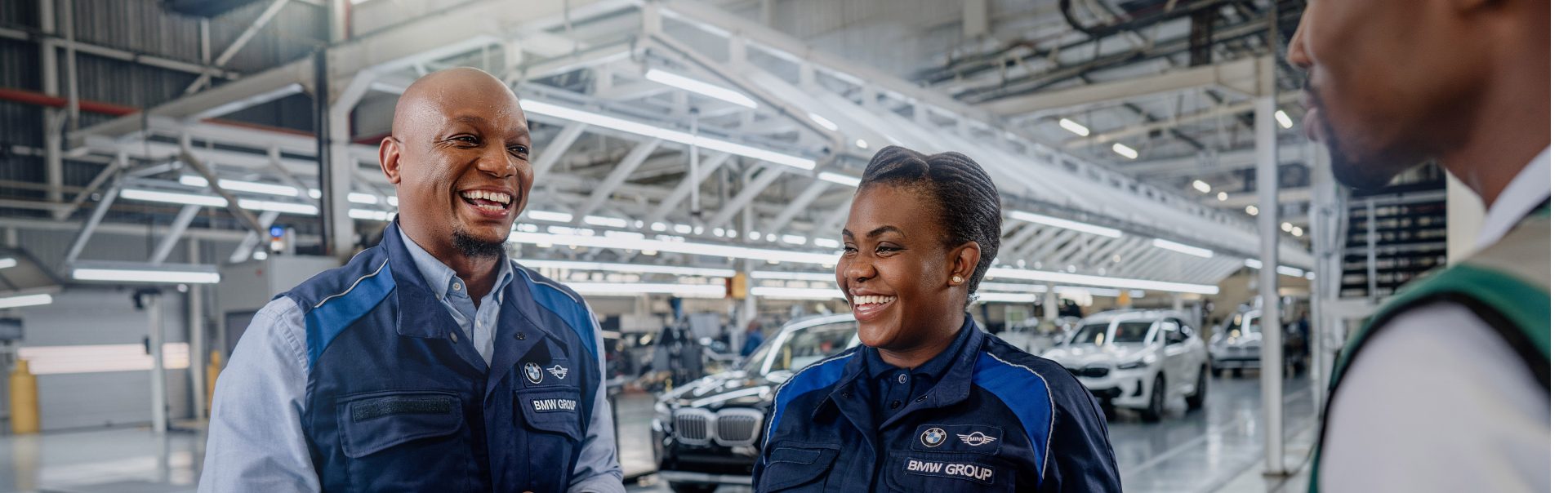 Three colleagues in South Africa having a chat in the production hall
